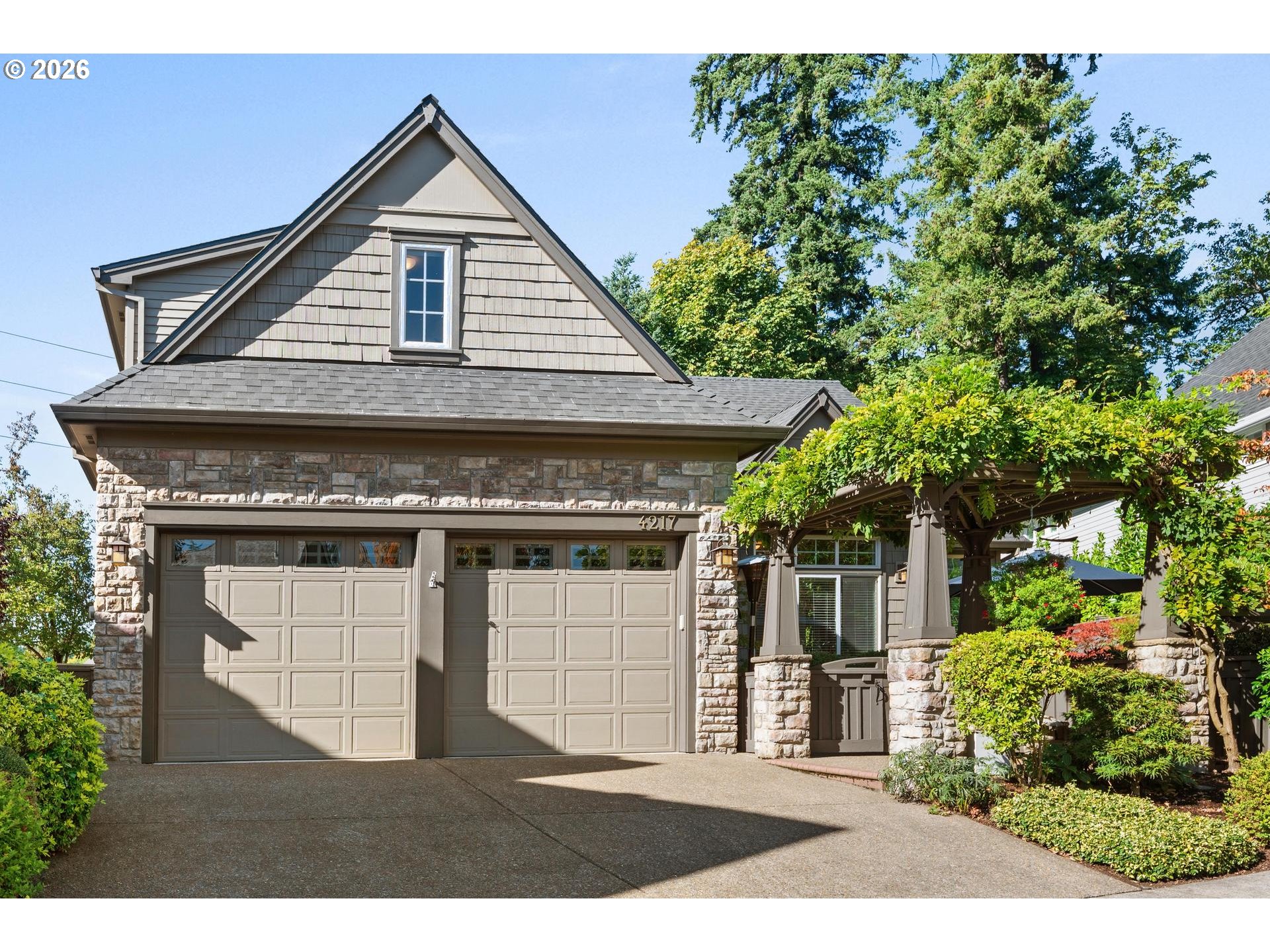 4217 Southwest 64th Court Portland, OR 97221 - Photo 2 of 48 a view of a house with a garage