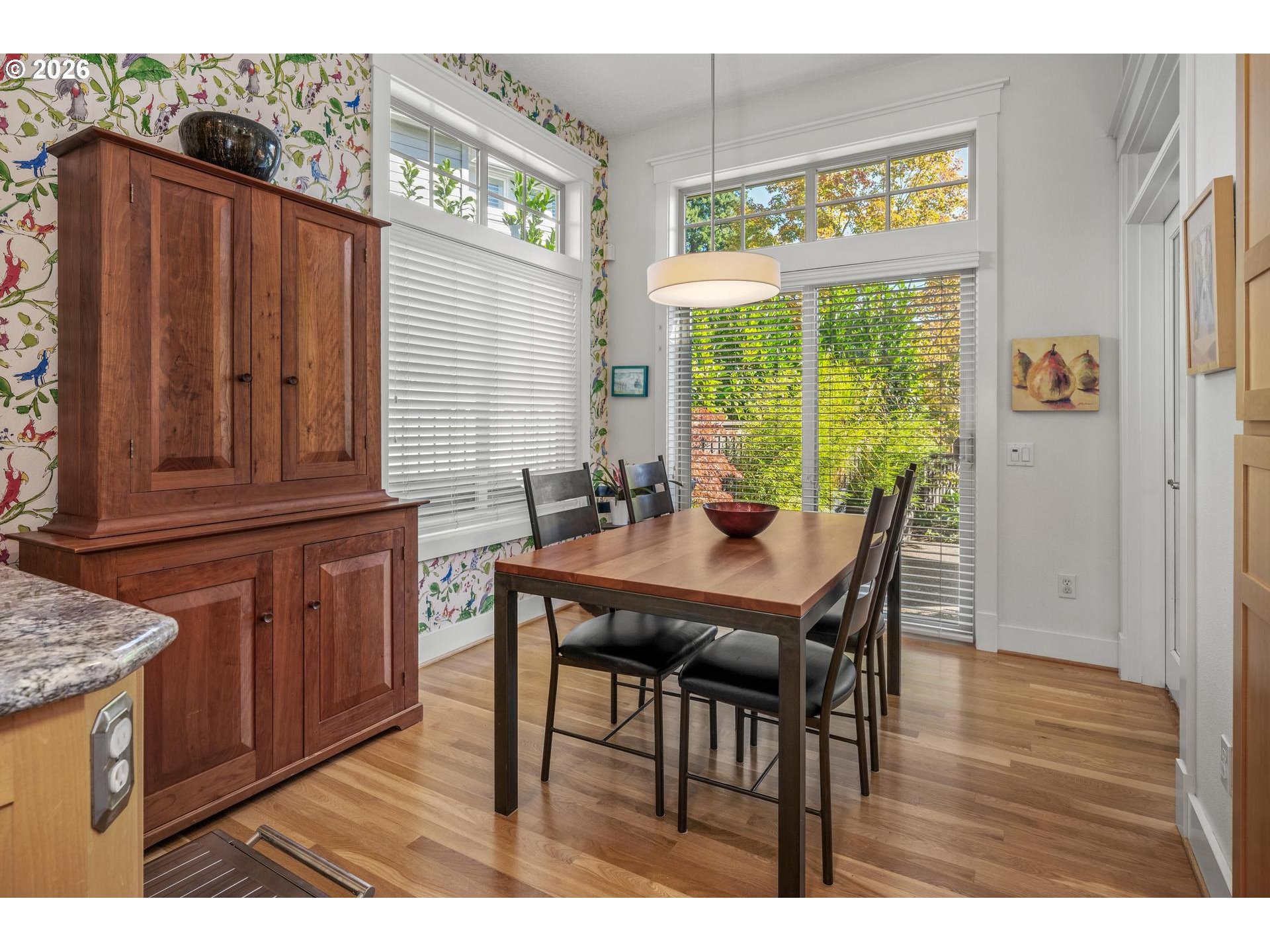 4217 Southwest 64th Court Portland, OR 97221 - Photo 23 of 48 a view of a dining room with furniture and a window