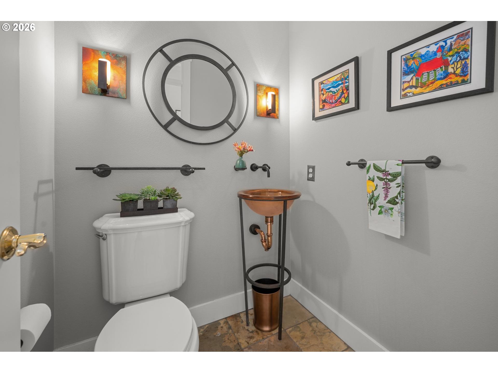 4217 Southwest 64th Court Portland, OR 97221 - Photo 36 of 48 a bathroom with a toilet a sink and a mirror