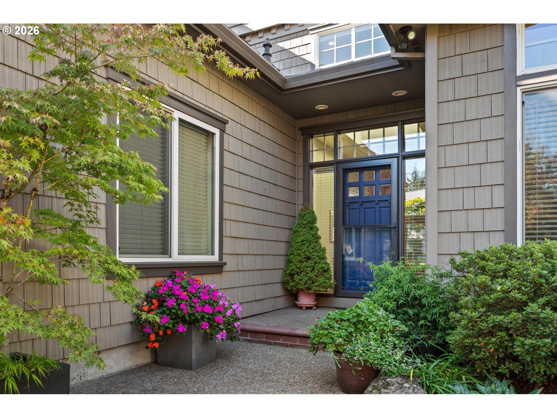 4217 Southwest 64th Court Portland, OR 97221 - Photo 4 of 48 a view of a house with a potted plant