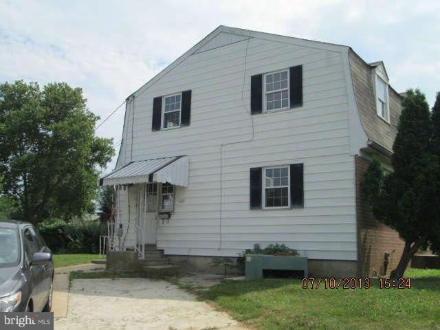 601 Crosby Road Baltimore, MD 21228 - Photo 3 of 16 a view of a house with a yard