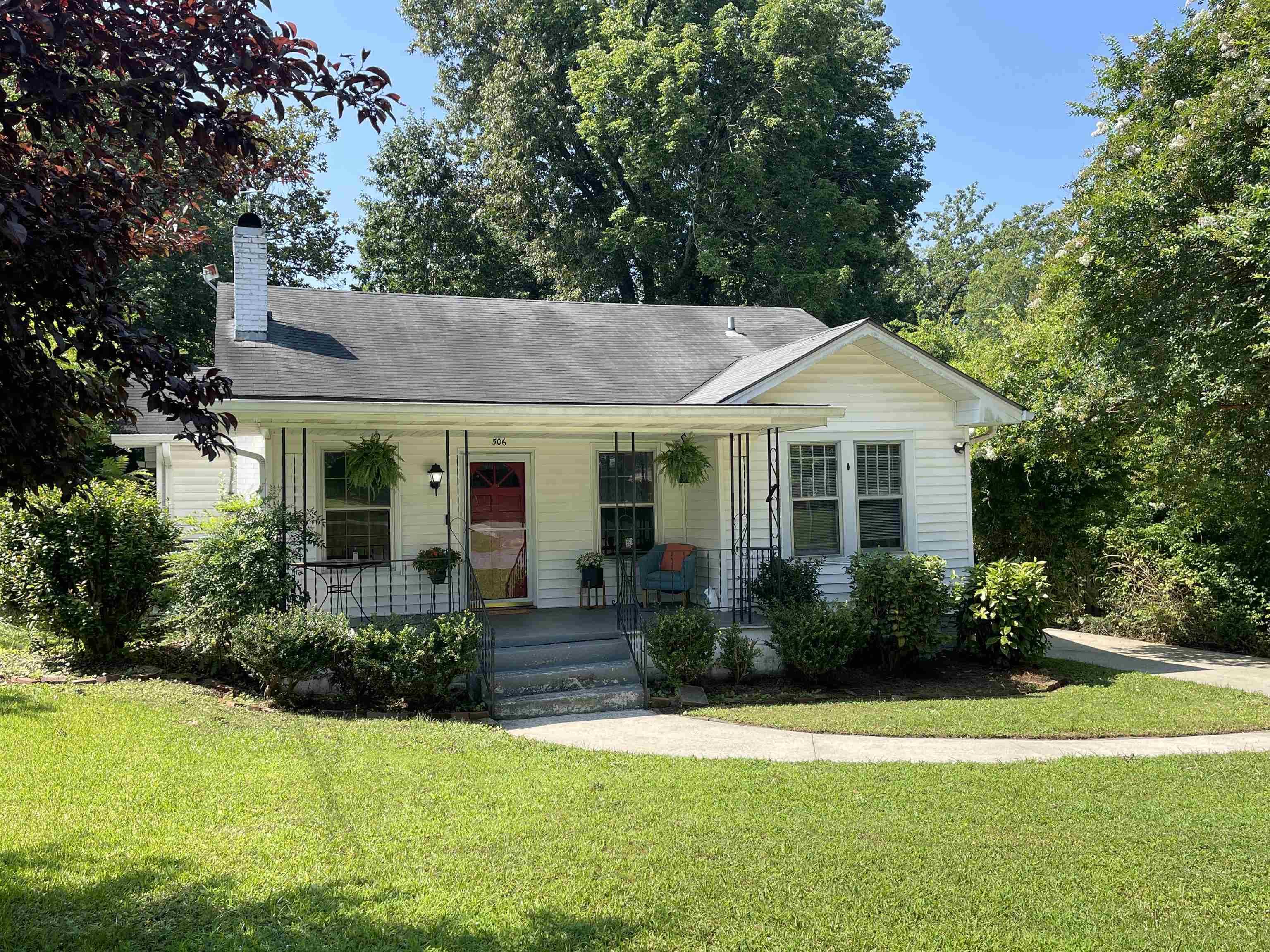 506 East 8th Street Southeast Rome, GA 30161 - Photo 1 of 1 a front view of a house with yard and green space