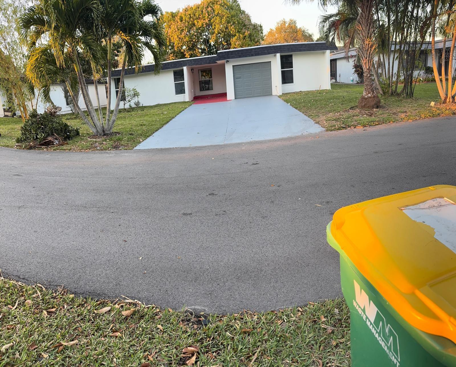 7007 Northwest 64th Street Tamarac, FL 33321 - Photo 1 of 46 front view of house with a yard