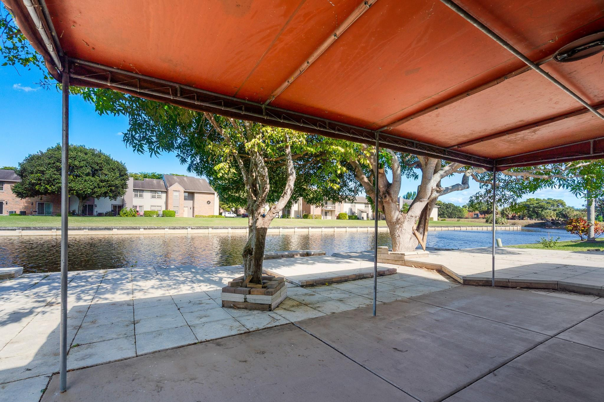 7007 Northwest 64th Street Tamarac, FL 33321 - Photo 31 of 46 a view of outdoor space and barbecue grill