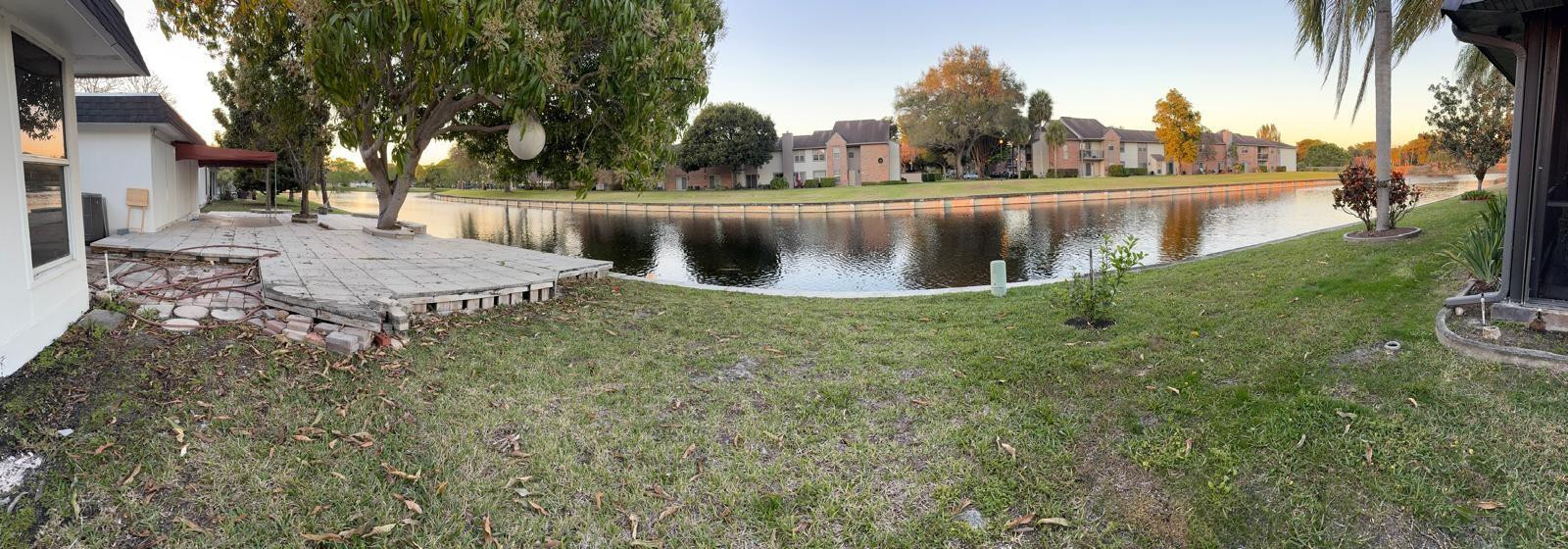 7007 Northwest 64th Street Tamarac, FL 33321 - Photo 33 of 46 a view of a lake with houses