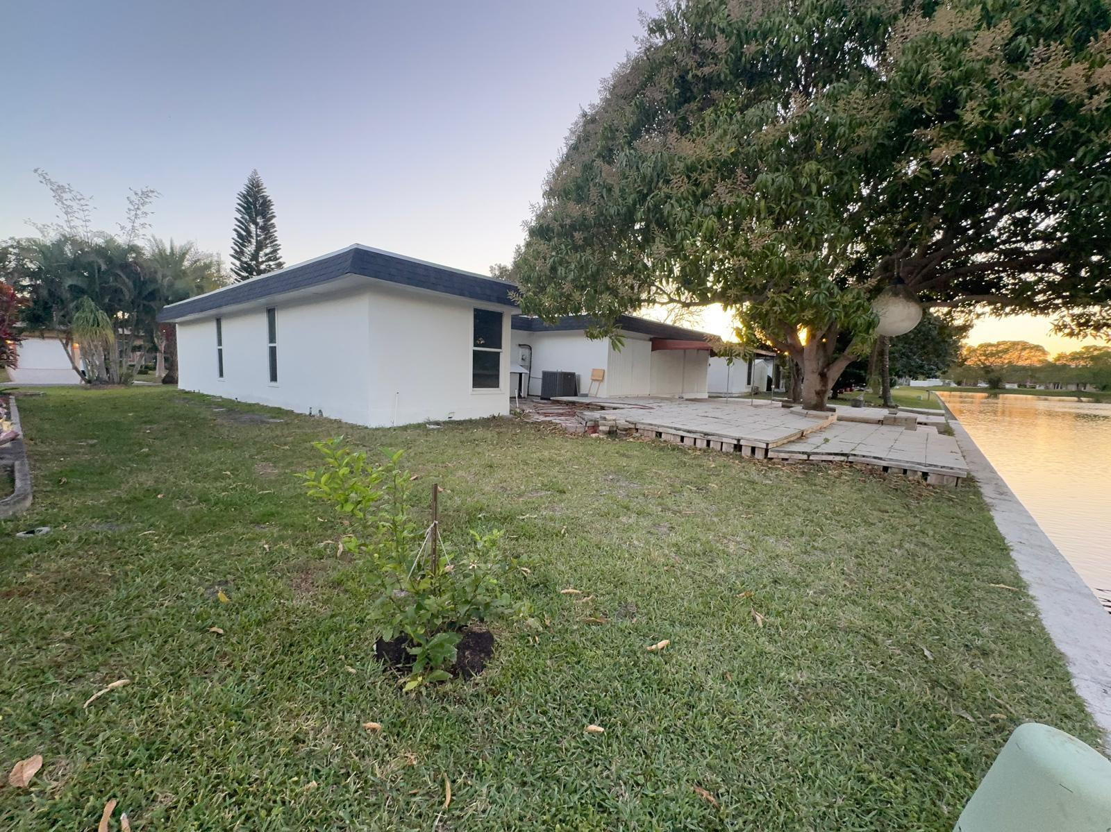 7007 Northwest 64th Street Tamarac, FL 33321 - Photo 34 of 46 a view of a house with a yard