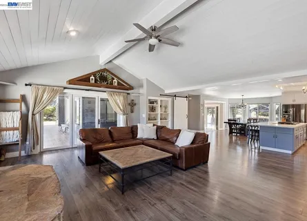 a kitchen with stainless steel appliances a refrigerator and a sink