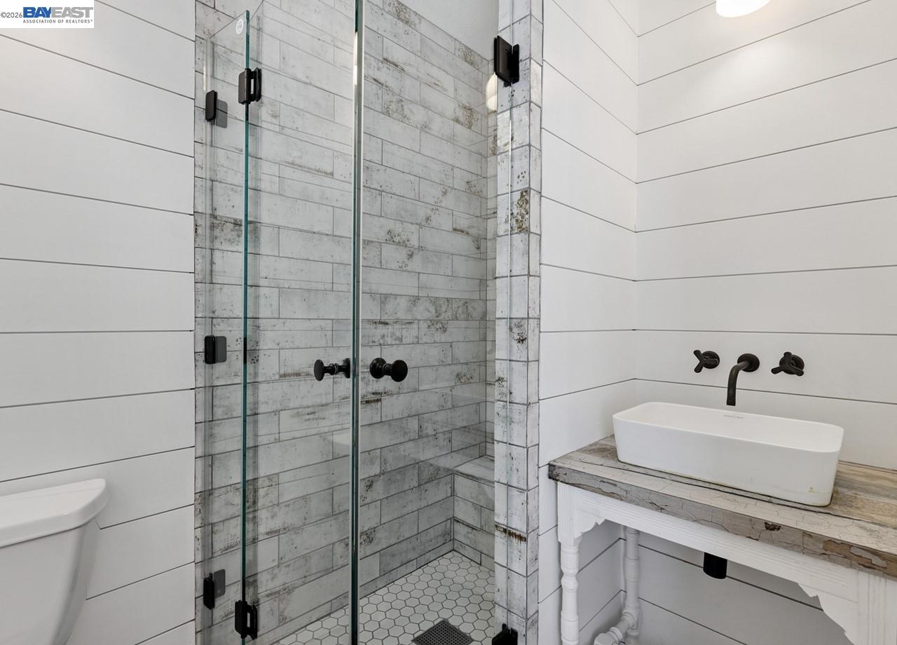 8191 Highland Road Livermore, CA 94551 - Photo 24 of 59 a bathroom with a sink and a shower