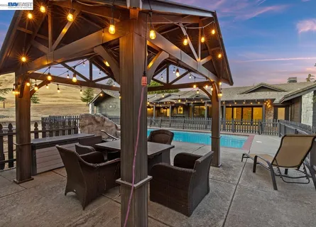a view of a house with a swimming pool