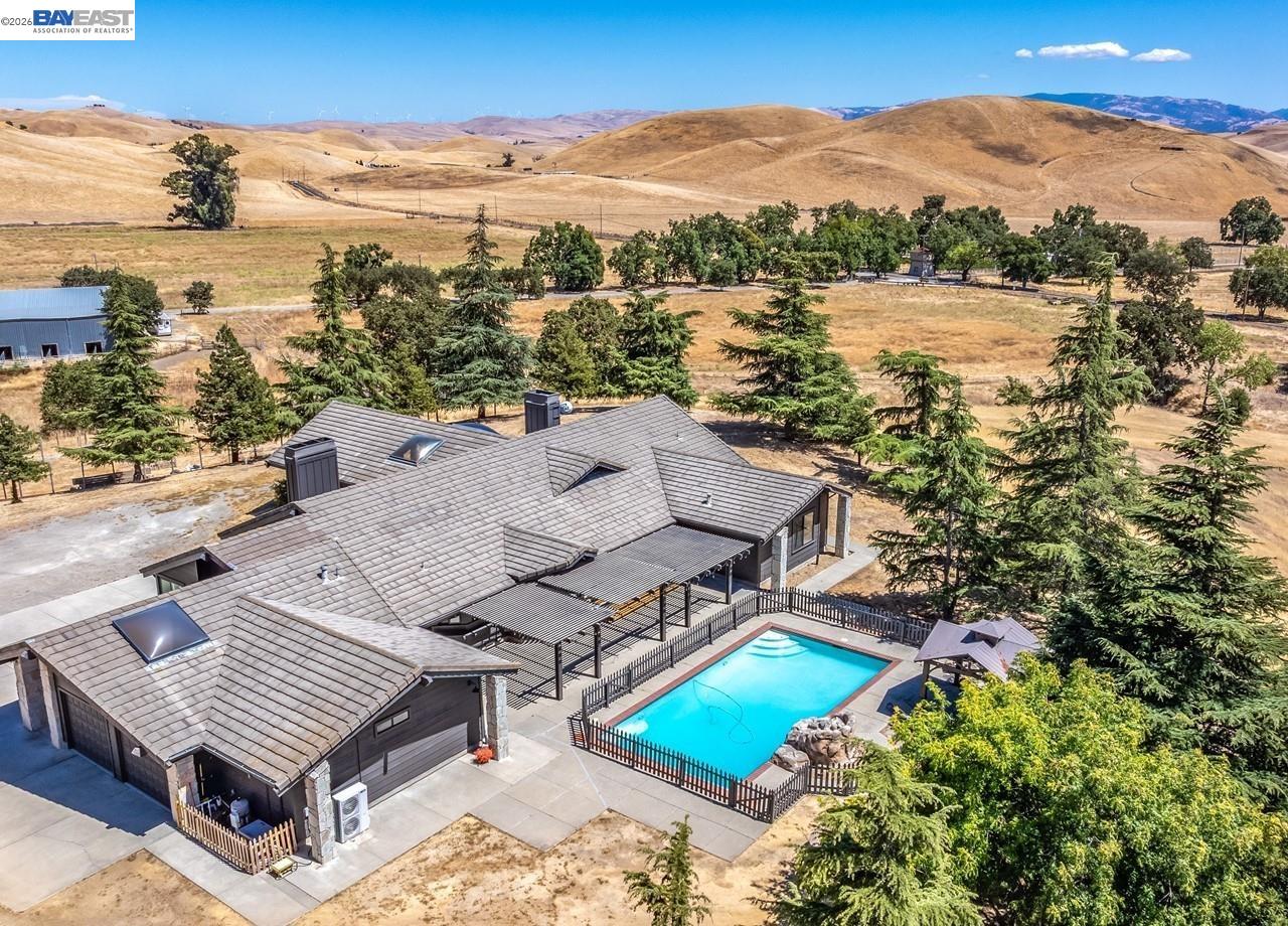 8191 Highland Road Livermore, CA 94551 - Photo 50 of 59 an aerial view of a house with a lake view