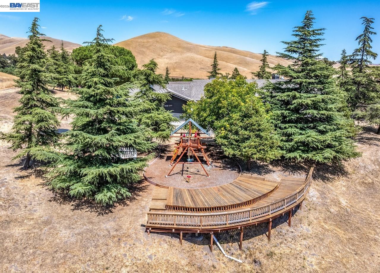 8191 Highland Road Livermore, CA 94551 - Photo 56 of 59 a swimming pool with trees in the background