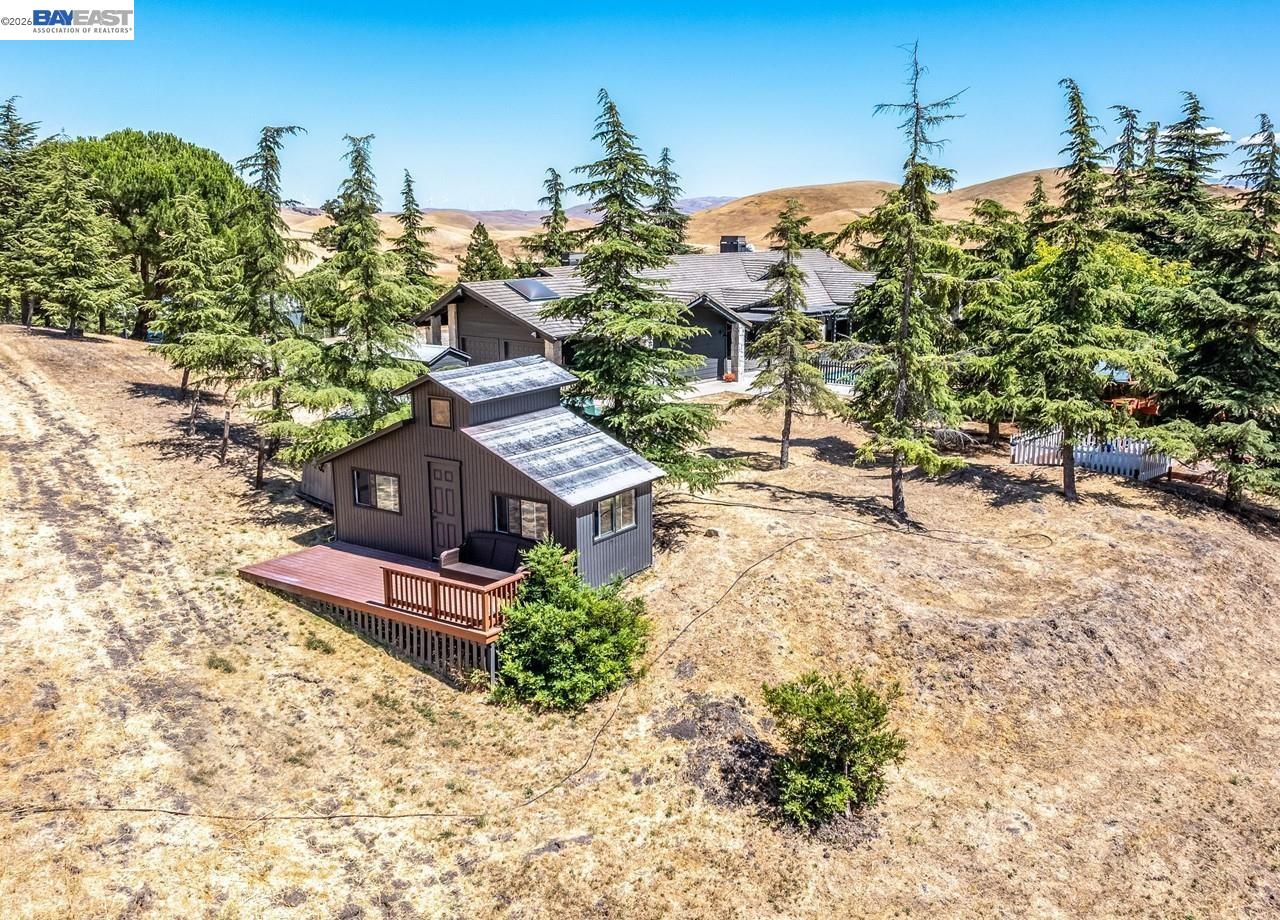 8191 Highland Road Livermore, CA 94551 - Photo 57 of 59 a view of a house with a yard and sitting area