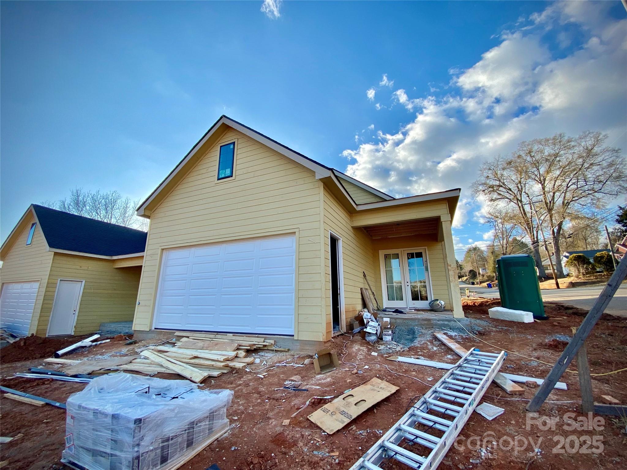 174 North Mitchell Street Rutherfordton, NC 28139 - Photo 2 of 7 a backyard of a house with barbeque oven table and chairs