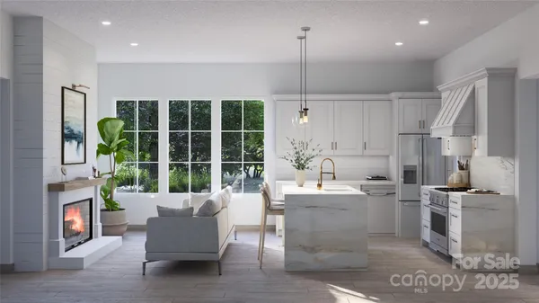 a living room with furniture a floor to ceiling window and entryway