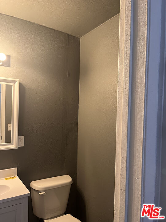 602 North Sloan Avenue, Unit A Compton, CA 90221 - Photo 3 of 9 a bathroom with a toilet