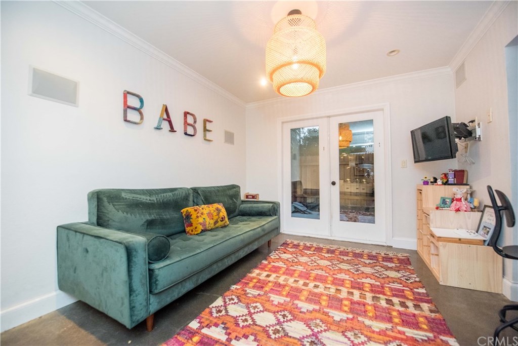 2841 Europa Drive Costa Mesa, CA 92626 - Photo 17 of 30 a living room with couch and a flat screen tv