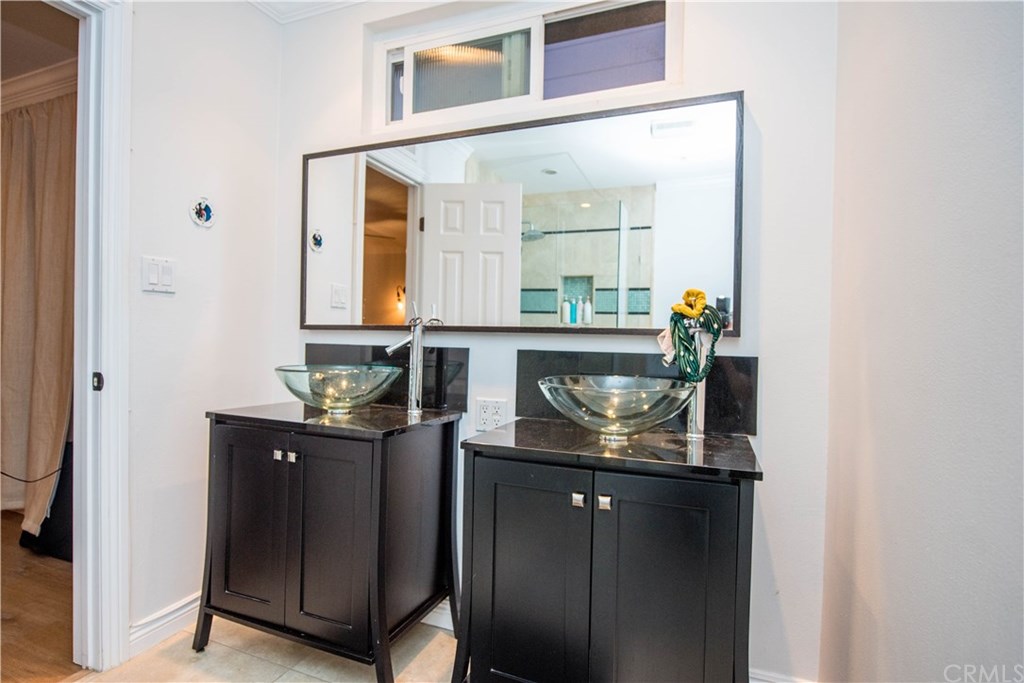 2841 Europa Drive Costa Mesa, CA 92626 - Photo 26 of 30 a close view of sink and mirror