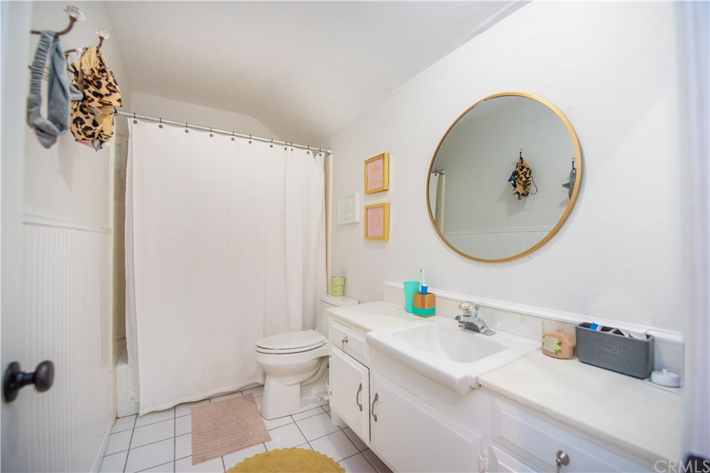 2841 Europa Drive Costa Mesa, CA 92626 - Photo 27 of 30 a bathroom with a sink and a mirror