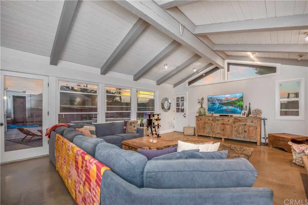 2841 Europa Drive Costa Mesa, CA 92626 - Photo 5 of 30 a living room with furniture and flat screen tv