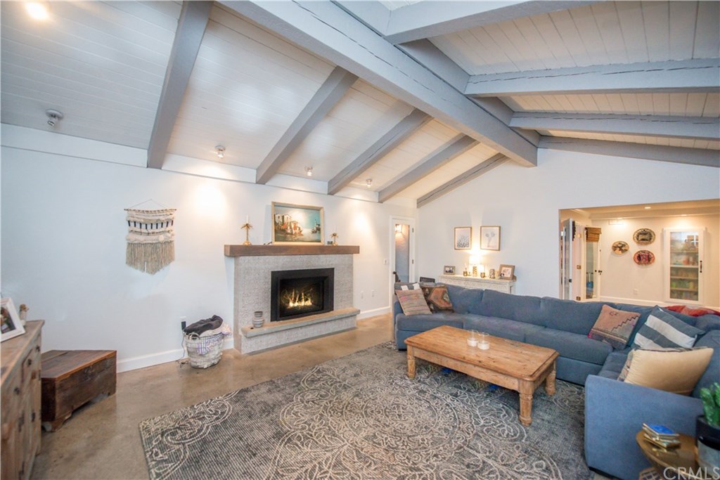 2841 Europa Drive Costa Mesa, CA 92626 - Photo 7 of 30 a living room with furniture and a fireplace