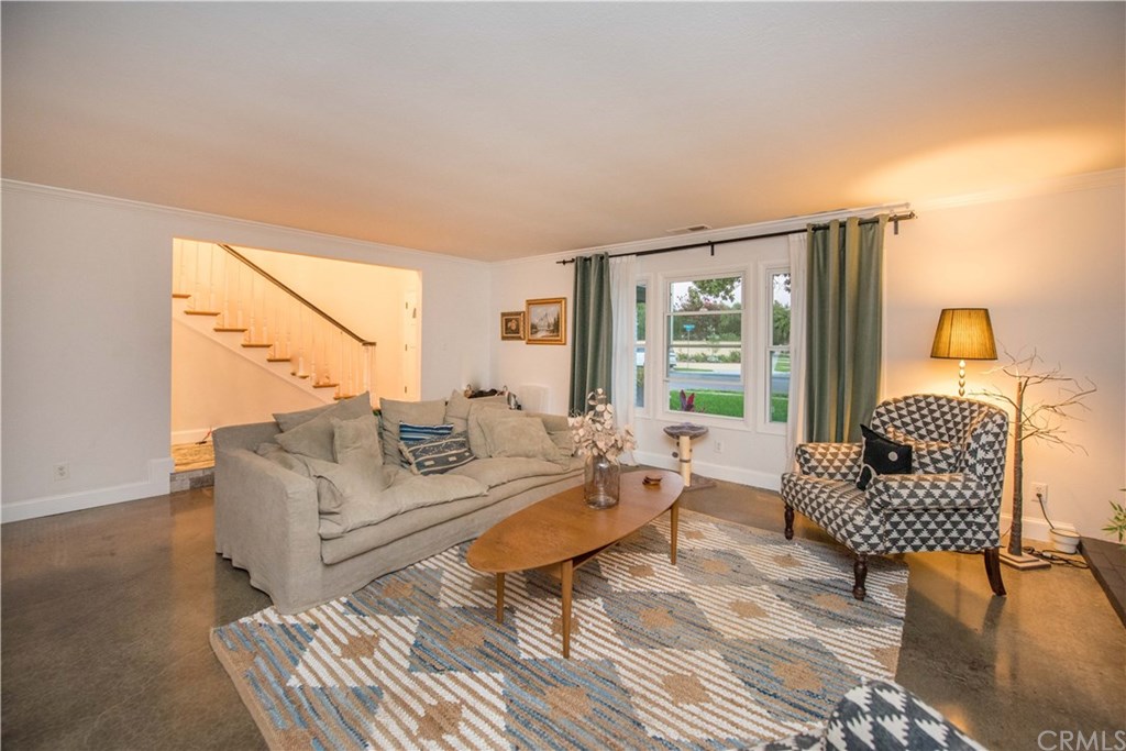 2841 Europa Drive Costa Mesa, CA 92626 - Photo 9 of 30 a living room with furniture and a window