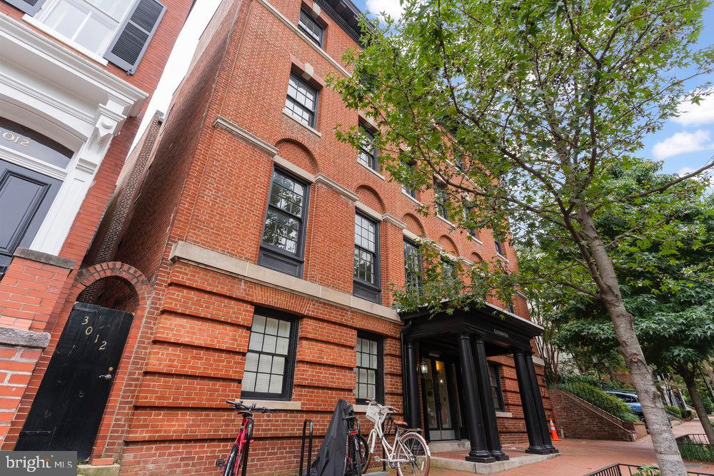 3016 Dumbarton Street Northwest, Unit 102 Washington, DC 20007 - Photo 4 of 23 a view of a building with street