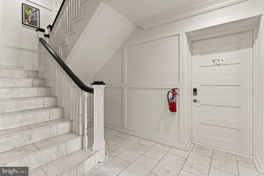 3016 Dumbarton Street Northwest, Unit 102 Washington, DC 20007 - Photo 7 of 23 a view of entryway with stairs