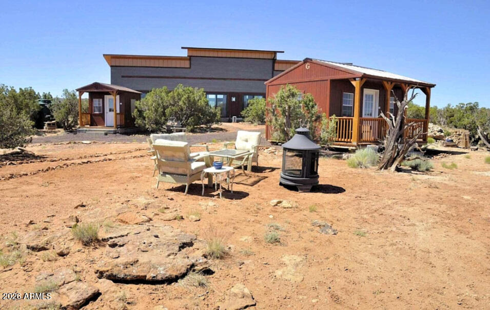 12 County Road Snowflake, AZ 85937 - Photo 45 of 85 a view of a chair and tables in backyard of the house