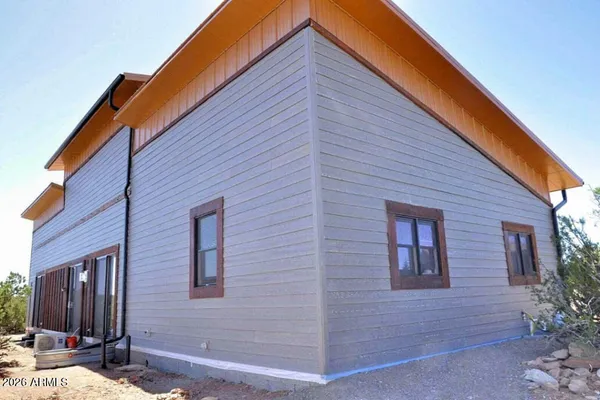 front view of a house with a patio