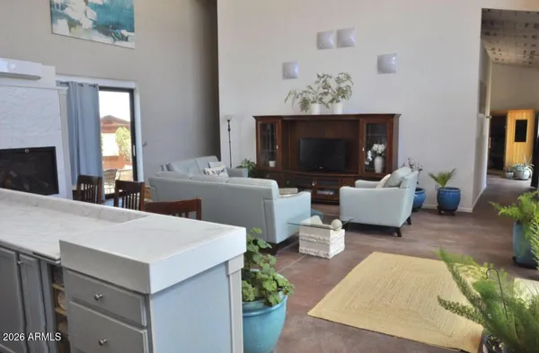 a kitchen with a sink cabinets and refrigerator