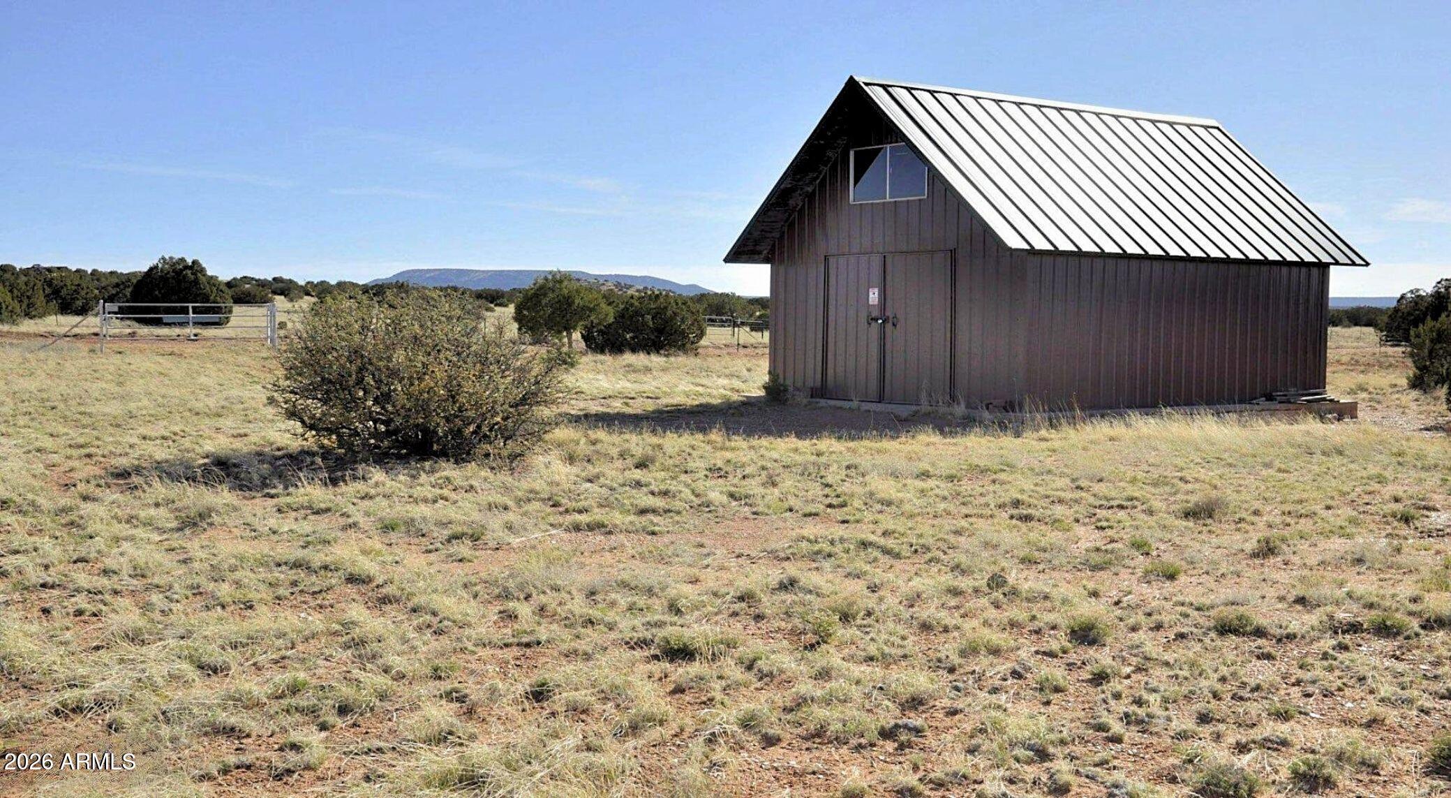 12 County Road Snowflake, AZ 85937 - Photo 75 of 85 a view of wooden house with a yard