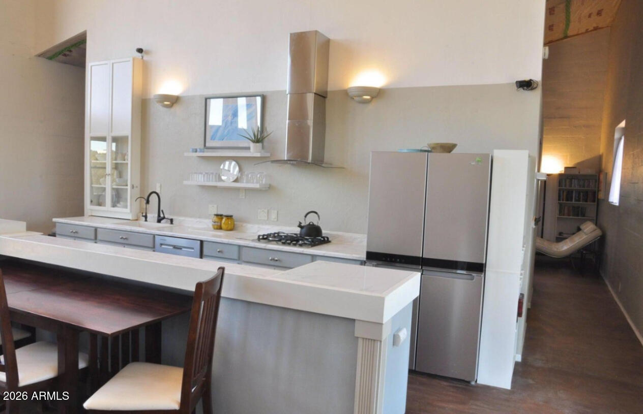 12 County Road Snowflake, AZ 85937 - Photo 8 of 85 a kitchen with a sink cabinets and refrigerator