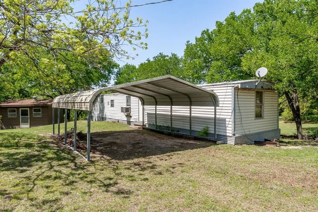 a house view with a garden space