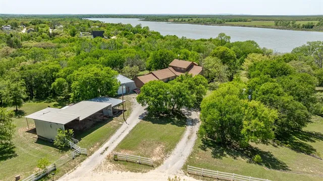 a view of a garden with an outdoor space and seating area