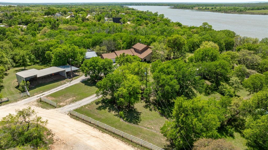 317 Peach Street Dublin, TX 76446 - Photo 13 of 38 a view of a house with a yard and lake view