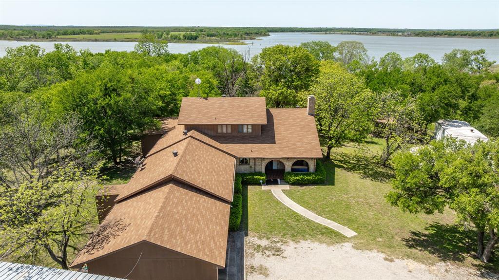 317 Peach Street Dublin, TX 76446 - Photo 15 of 38 a view of a house with ocean view