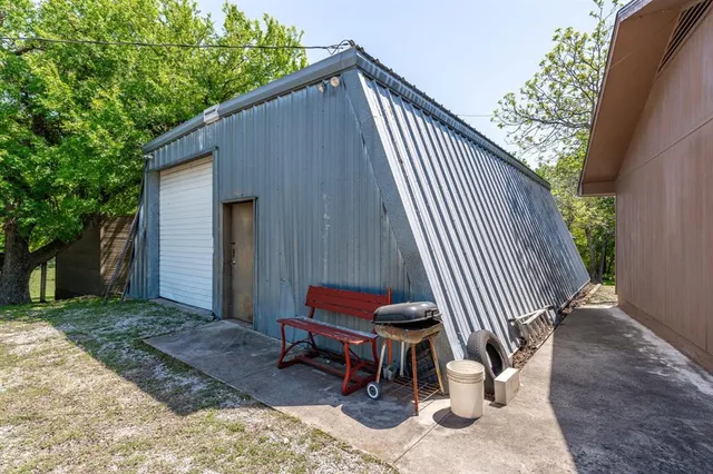 a backyard of a house with seating space