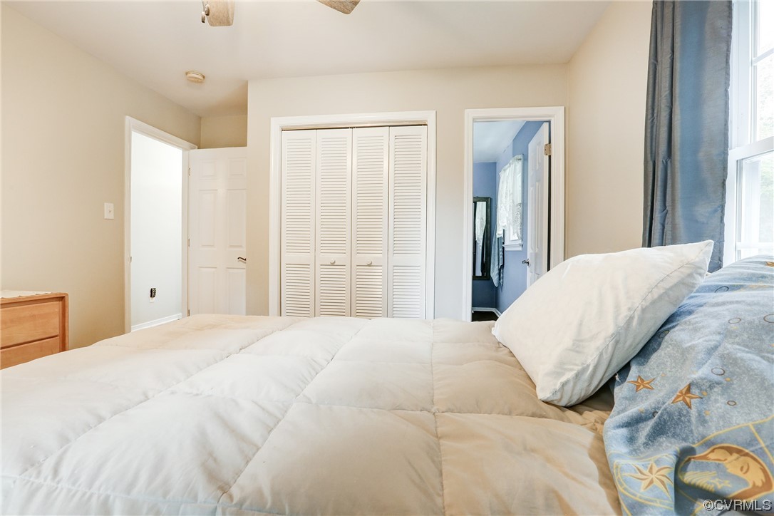 6723 Cherry Road Quinton, VA 23141 - Photo 20 of 44 a bedroom with a large bed and a closet