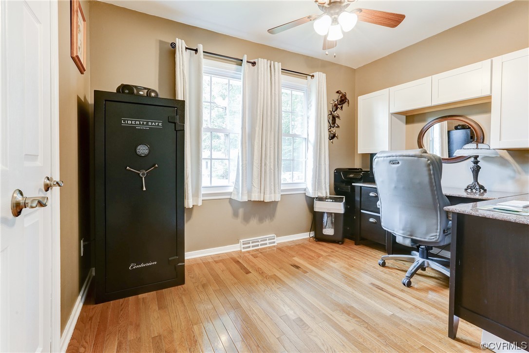 6723 Cherry Road Quinton, VA 23141 - Photo 25 of 44 a view of a workspace with furniture and a window