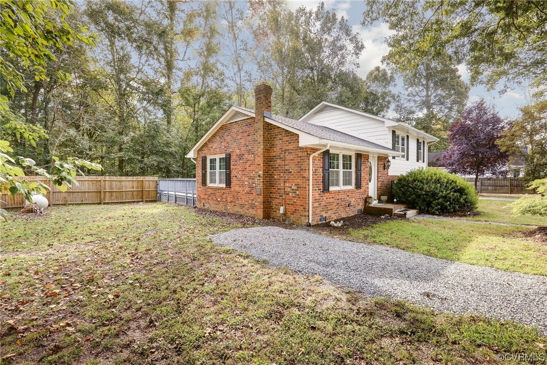 6723 Cherry Road Quinton, VA 23141 - Photo 3 of 44 a view of a house with a yard