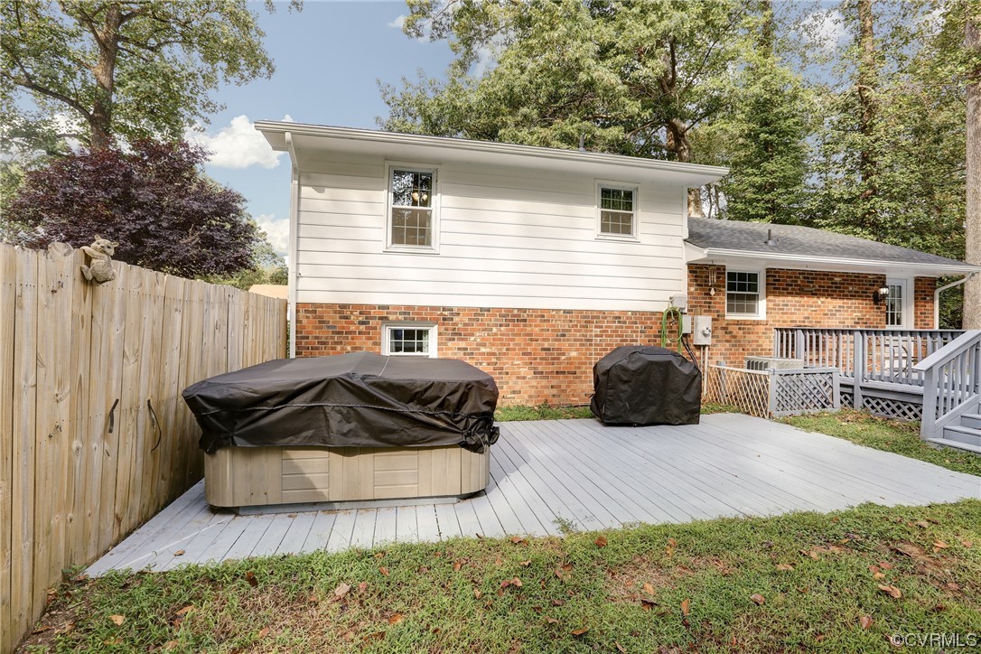 6723 Cherry Road Quinton, VA 23141 - Photo 31 of 44 a view of a house with backyard and sitting area