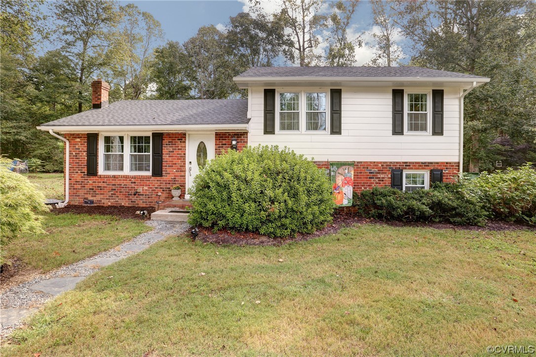 6723 Cherry Road Quinton, VA 23141 - Photo 34 of 44 front view of a house with a yard