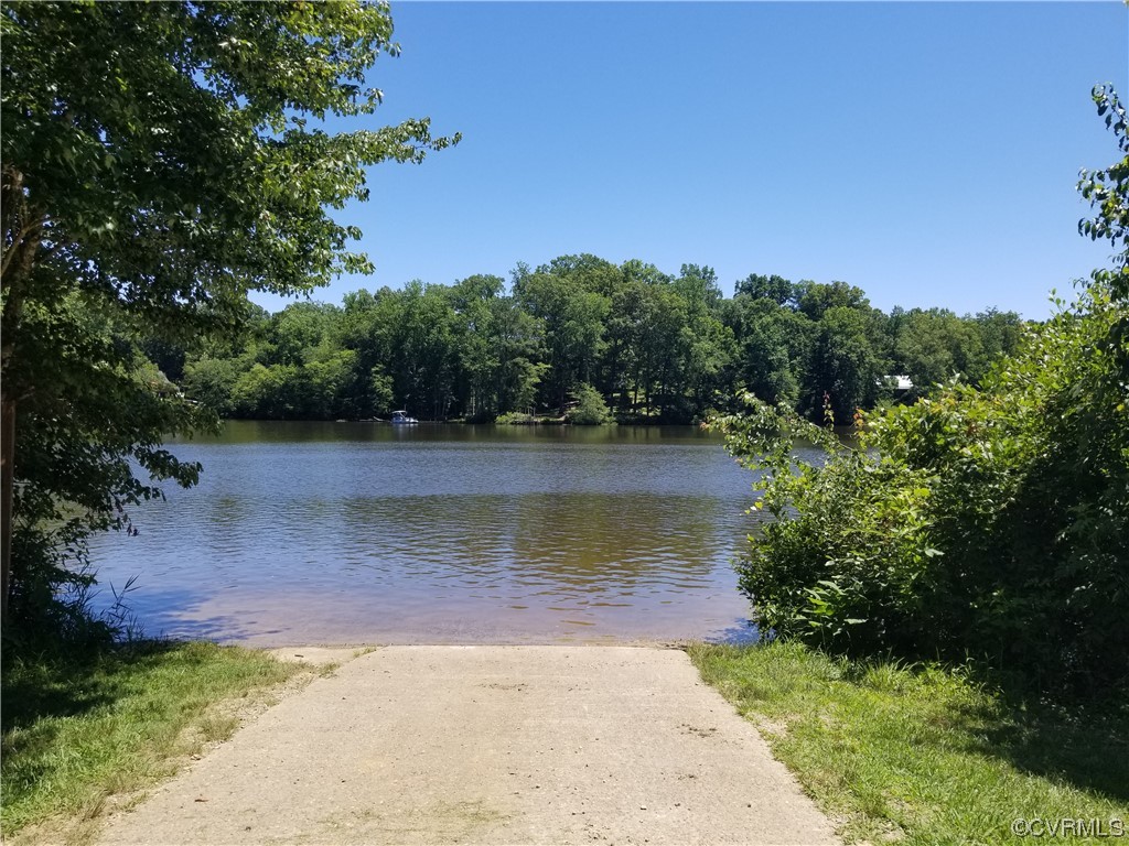 6723 Cherry Road Quinton, VA 23141 - Photo 40 of 44 a view of a lake with houses in the background