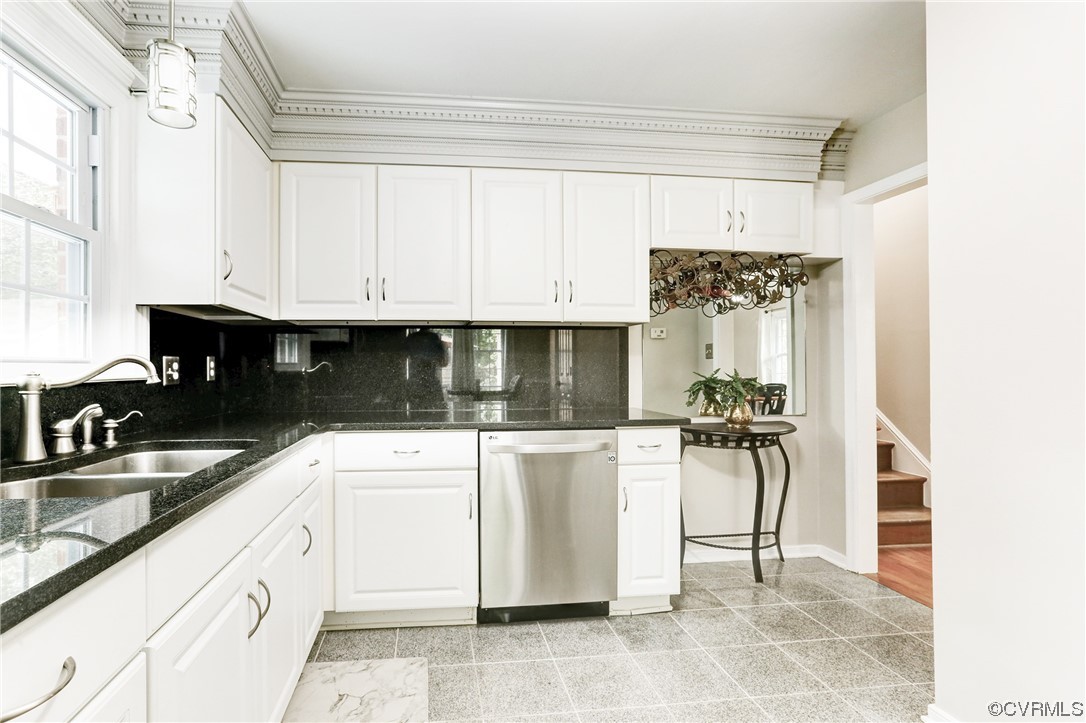 6723 Cherry Road Quinton, VA 23141 - Photo 8 of 44 a kitchen with granite countertop a sink a stove and cabinets