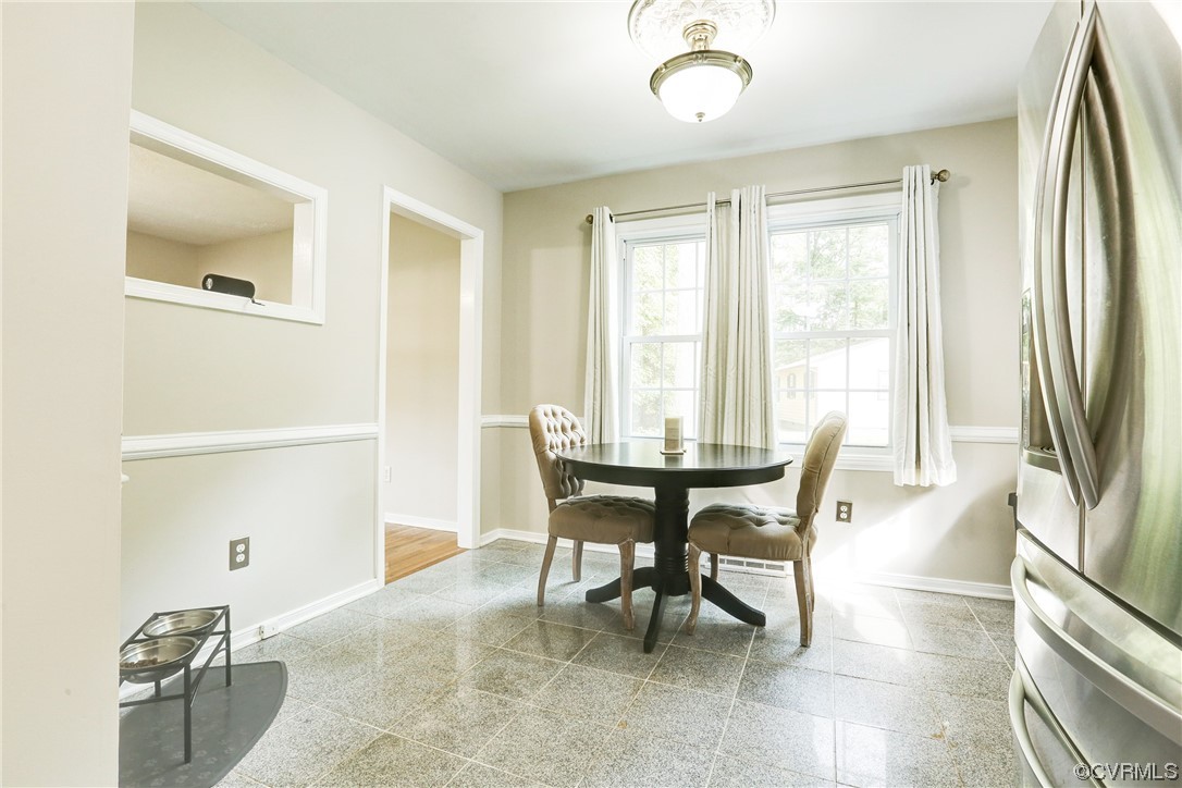 6723 Cherry Road Quinton, VA 23141 - Photo 9 of 44 a view of a dining room with furniture and a window