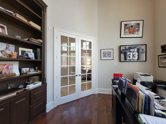 a view of a workspace with furniture and toys