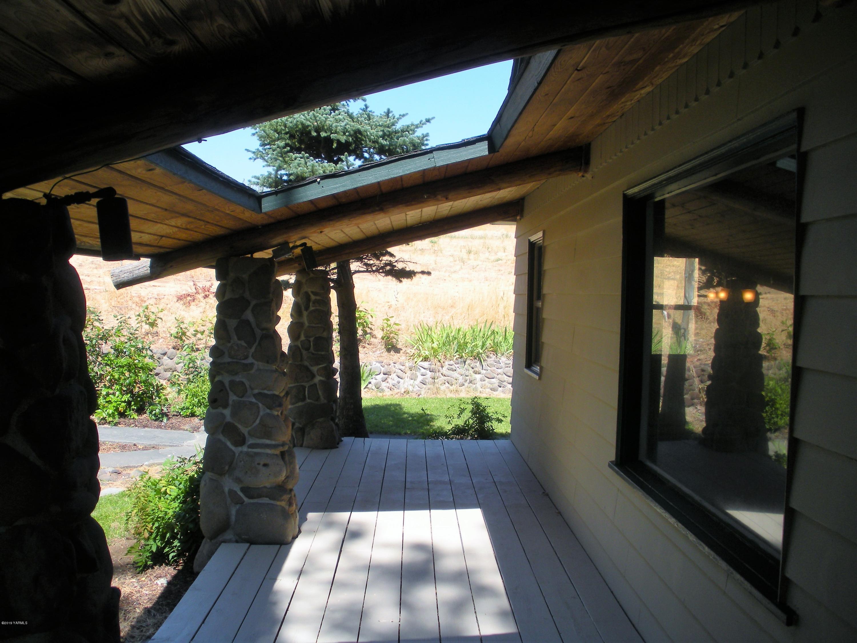 1151 Cook Road Yakima, WA 98908 - Photo 15 of 26 a view of porch with a yard
