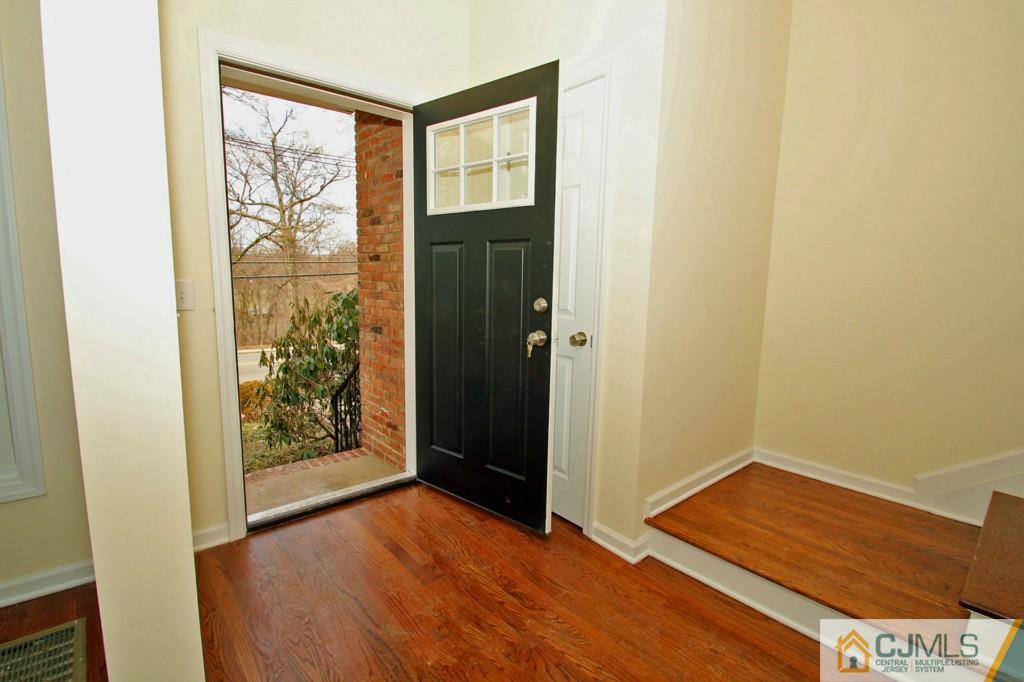 305 Chain O' Hills Road Colonia, NJ 07067 - Photo 16 of 20 an empty room with windows and closet