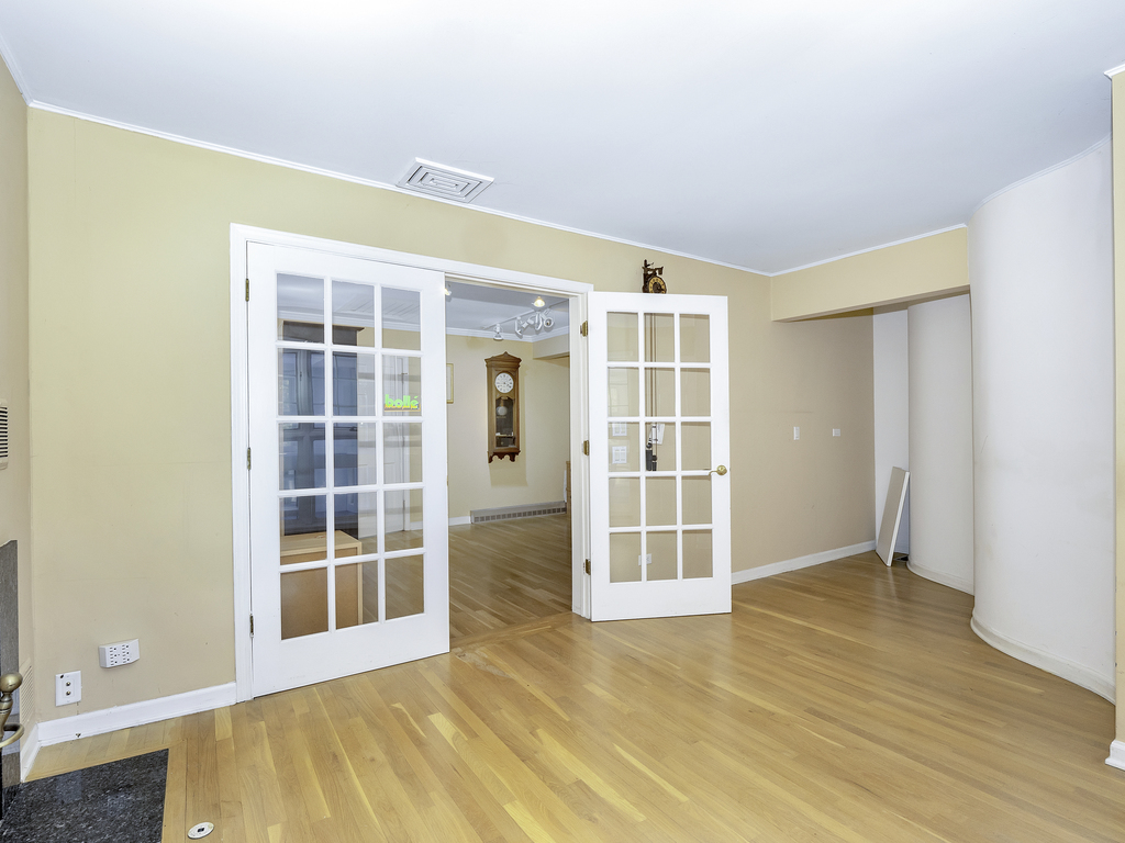 85 Ridgecroft Lane Barrington, IL 60010 - Photo 26 of 53 an empty room with wooden floor and windows
