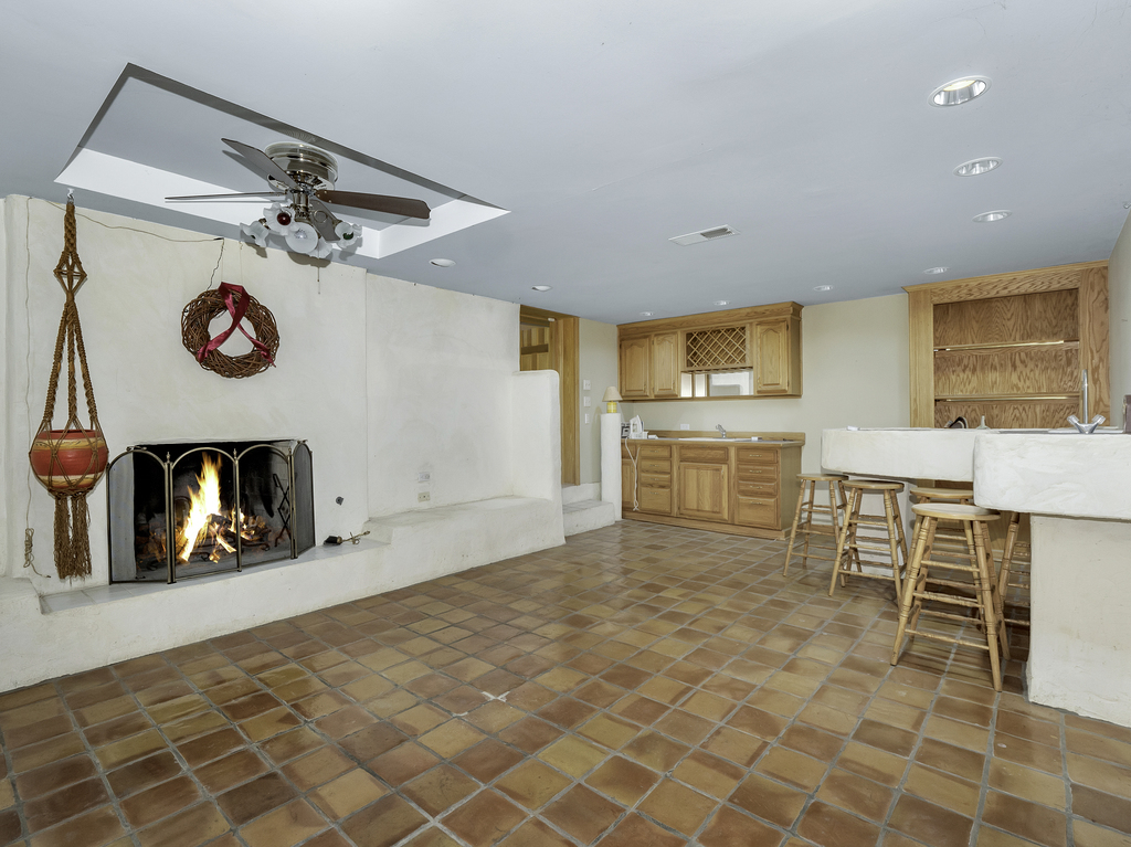 85 Ridgecroft Lane Barrington, IL 60010 - Photo 34 of 53 a view of a kitchen with furniture and a fireplace